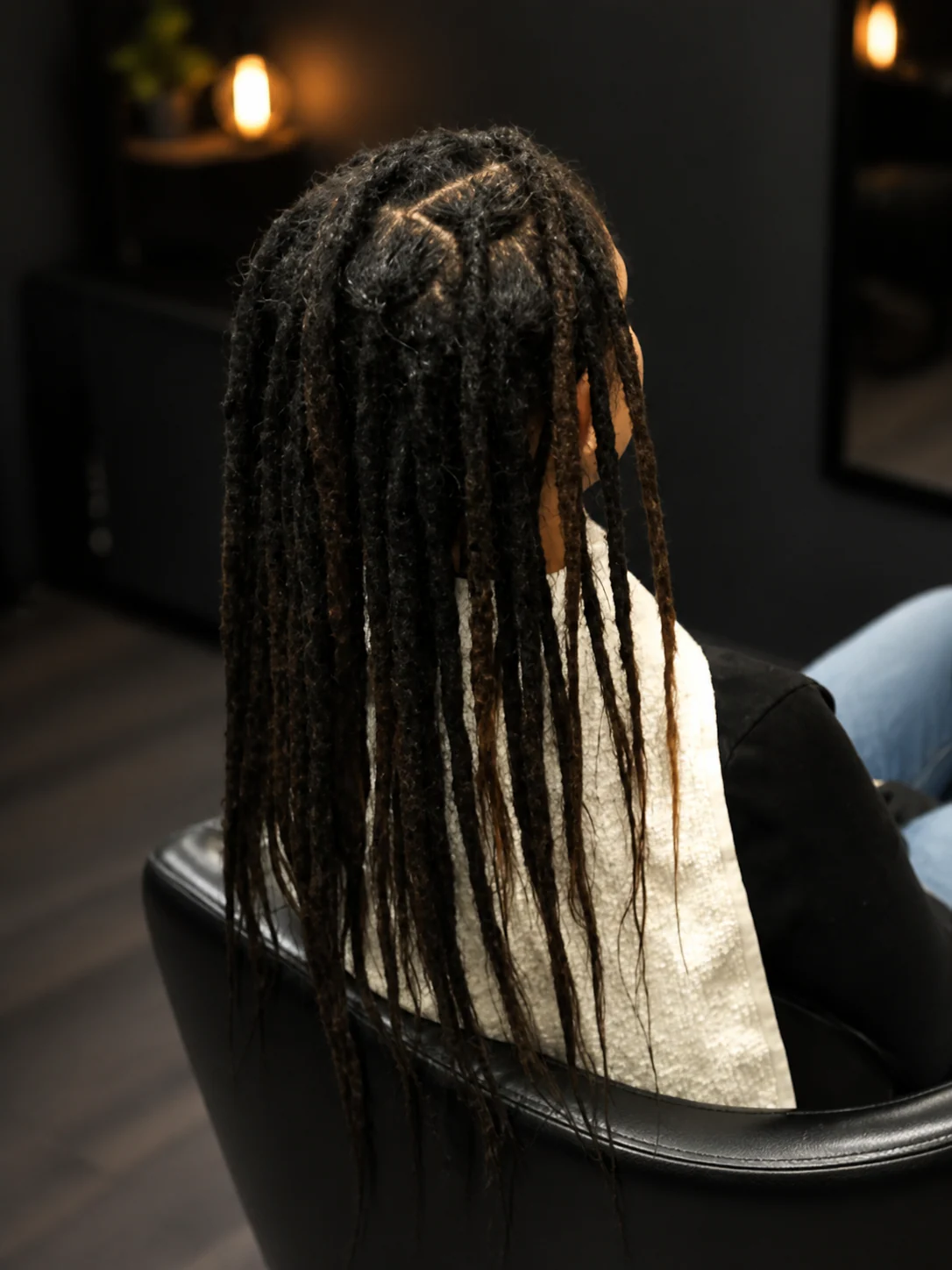 Full-length view of long locs after maintenance by Samonti